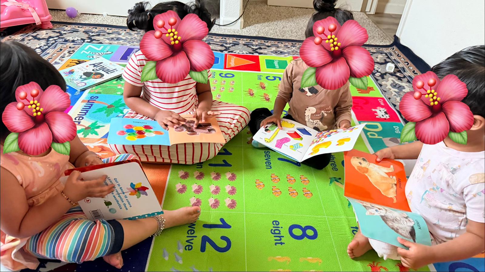 Children reading books during daycare activity time